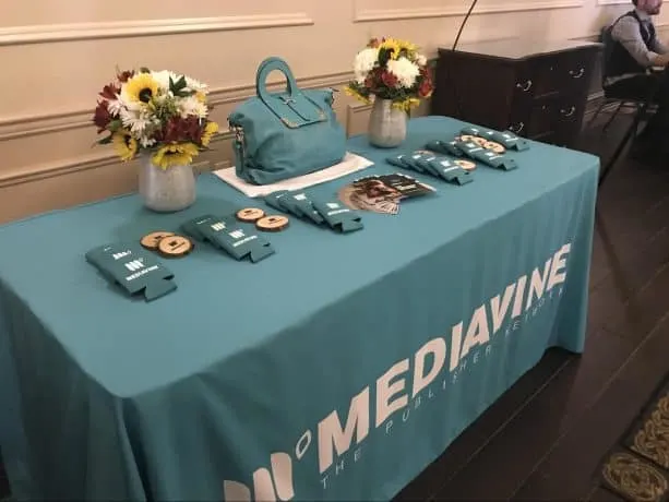 The Mediavine raffle table, displaying the teal camera bag.