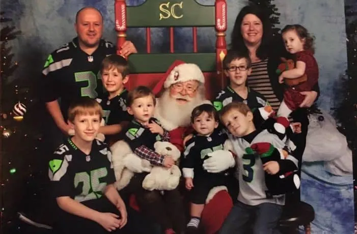 Mediavine Director of Publisher Support along with husband, seven children, and Santa.