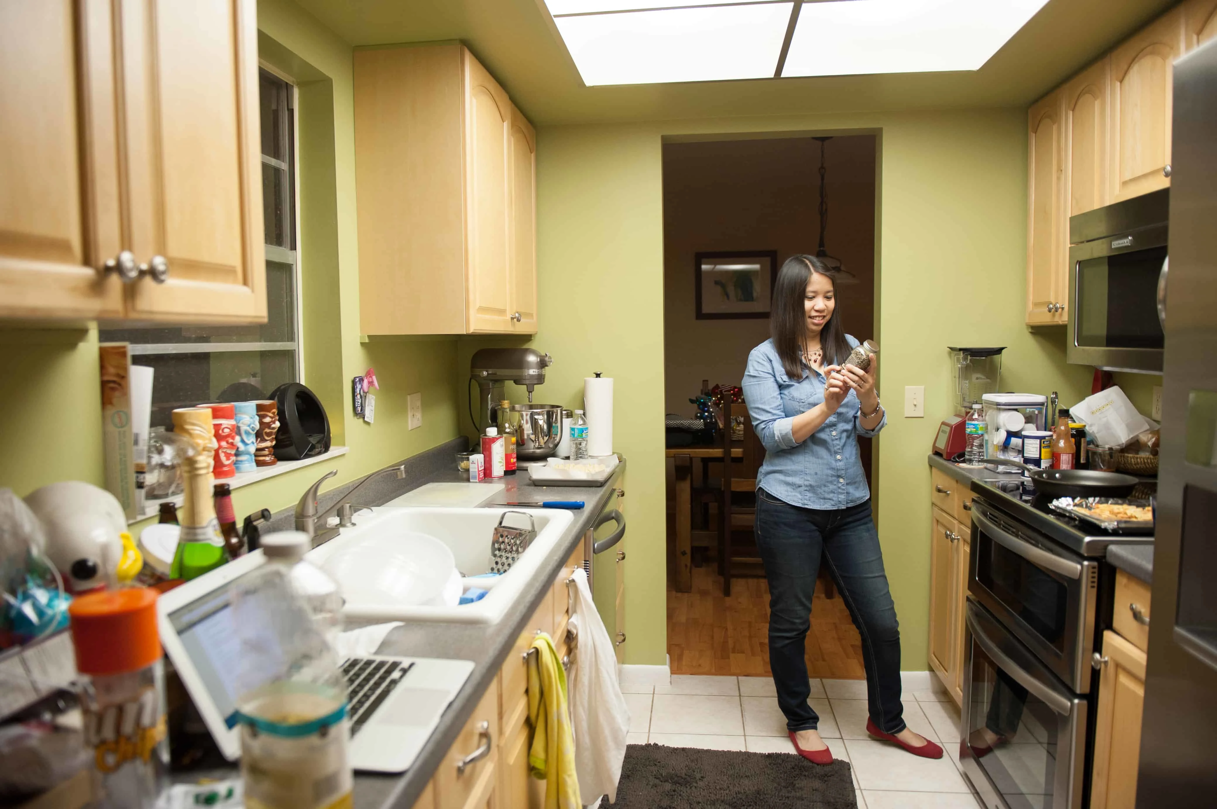 The kitchen behind The Little Kitchen, along with blogger Julie Deily.