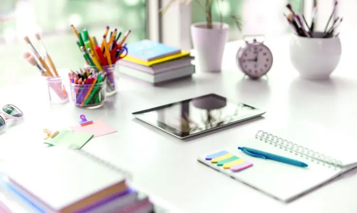 organized stationery on a desk.