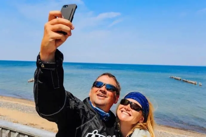Deb and Dave snapping a selfie at the beach.