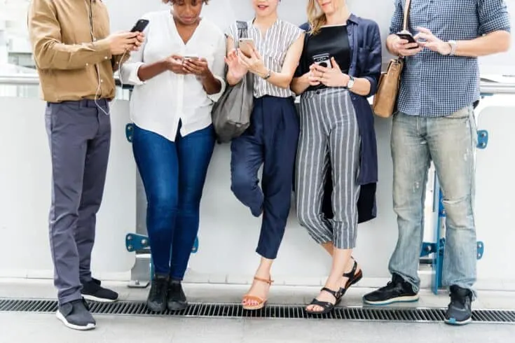 group of people on their smartphones