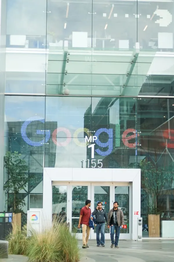 Three men walking out of Google Headquarters in Mountain View, CA.