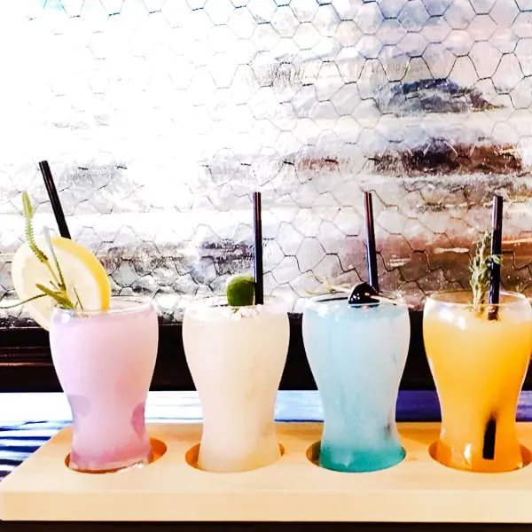 A lineup of fancy cocktails.