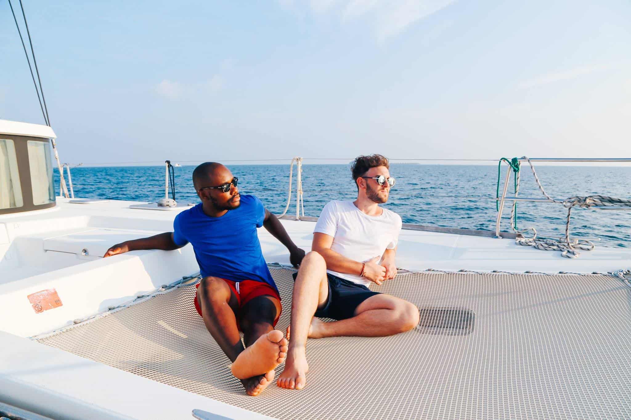 yaya and lloyd sitting on a boat