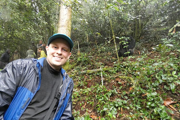 Jeremy Jones from Living the Dream RTW with a Gorilla while on his travels.