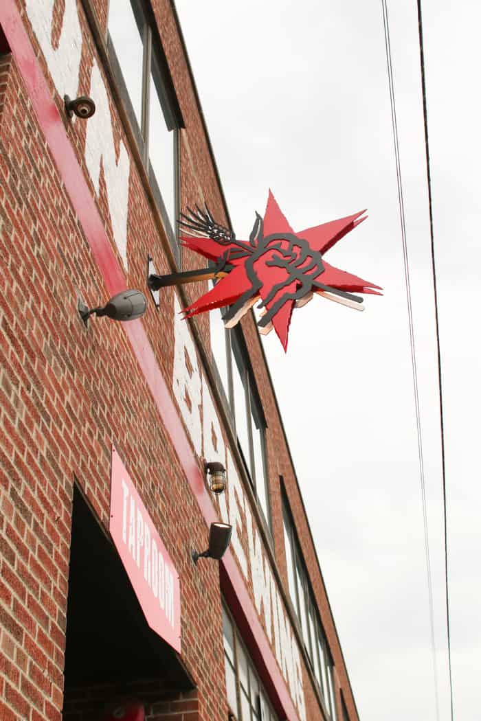 The sign for Revolution Brewing as seen from the street.
