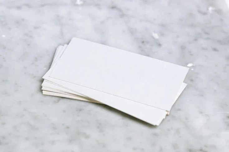A stack of blank business cards.