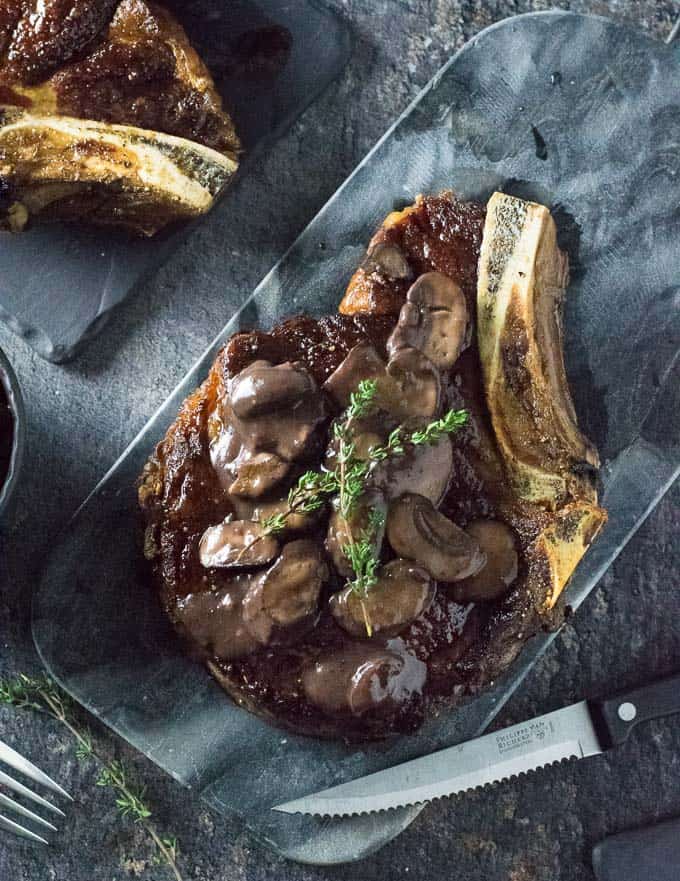 Steak with mushrooms.