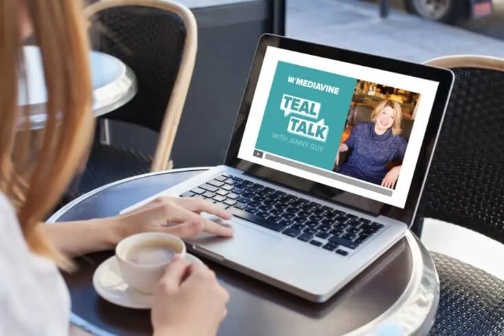 A woman watching Teal Talk on a laptop computer.