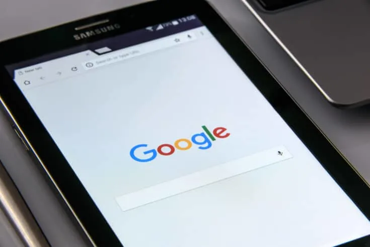 A tablet displaying the Google search homepage.
