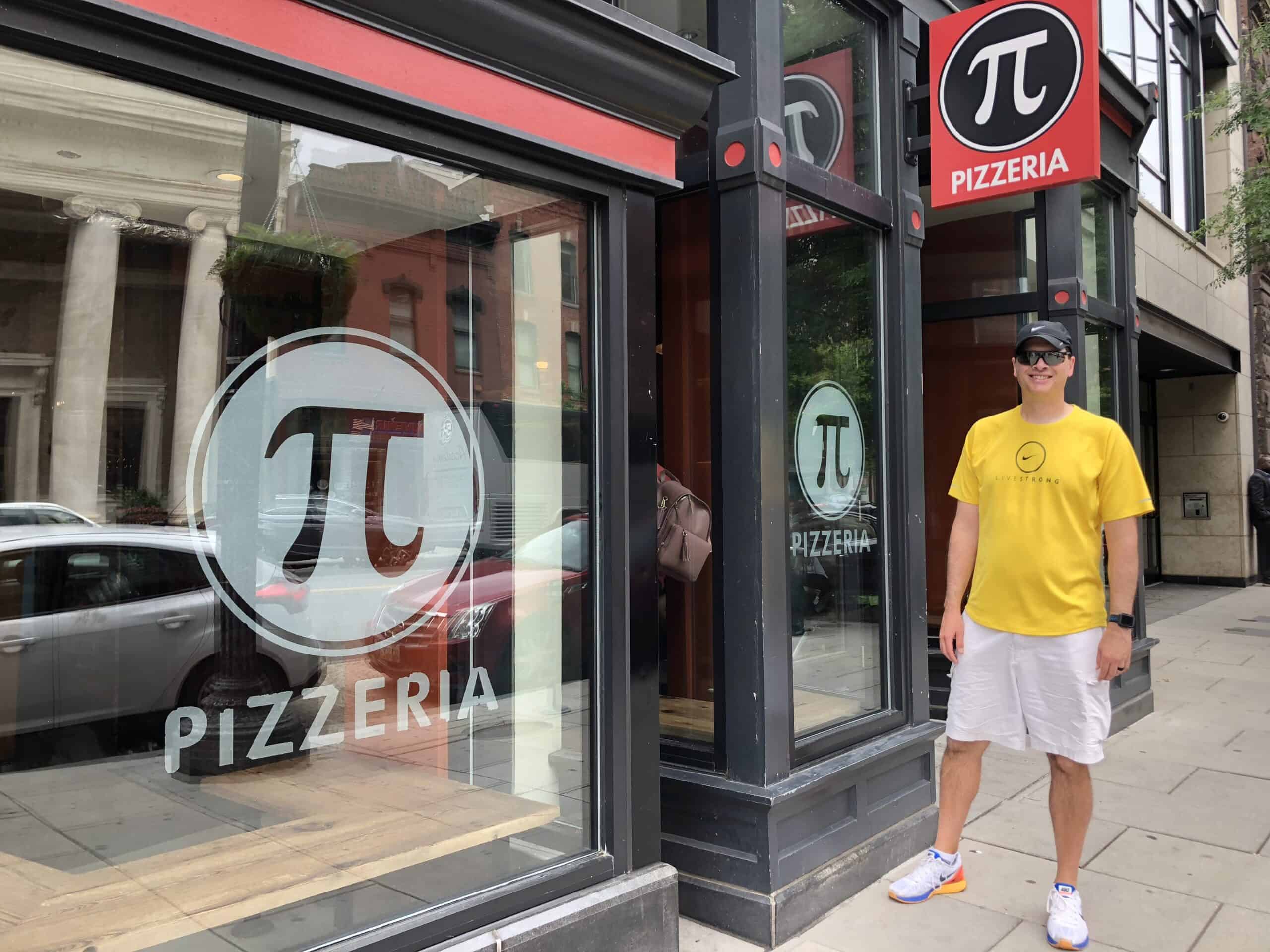 John Nardini of ESI Money blog outside of pizzeria while traveling