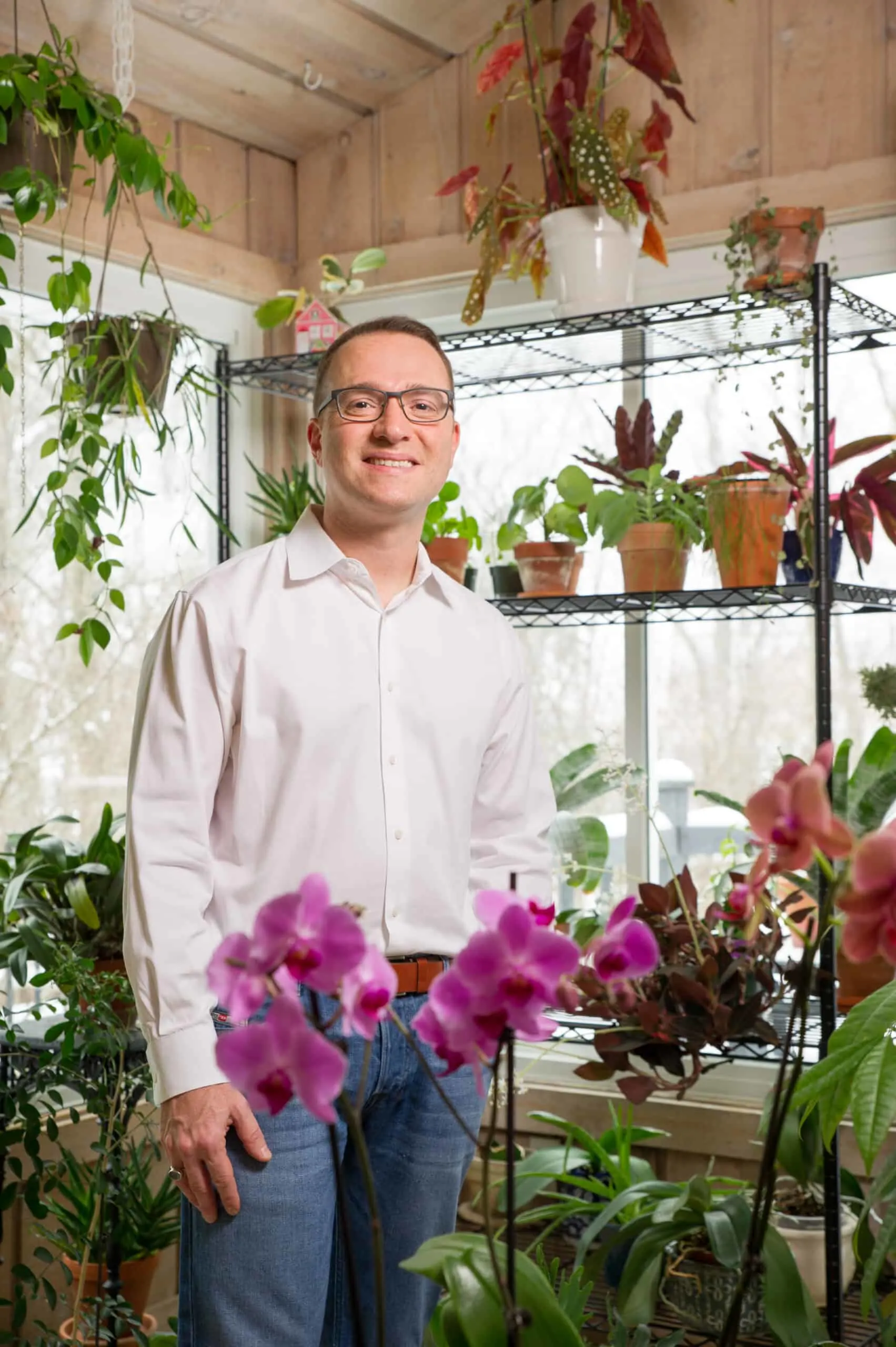 Raffaele Di Lallo of Ohio Tropics with houseplants