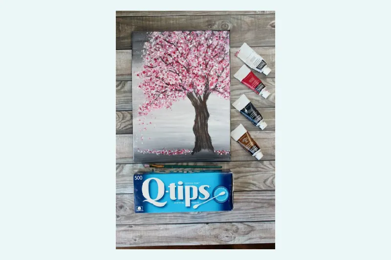 feeling nifty using Qtips to paint a cherry blossom tree