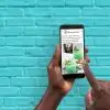 person using grow.me on phone