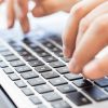 closeup of fingers typing
