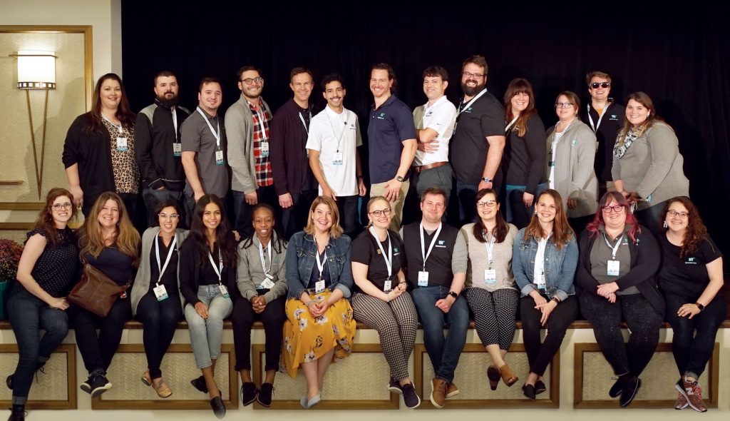 the mediavine team posing for a photo on the stage of our conference in austin, texas in 2019
