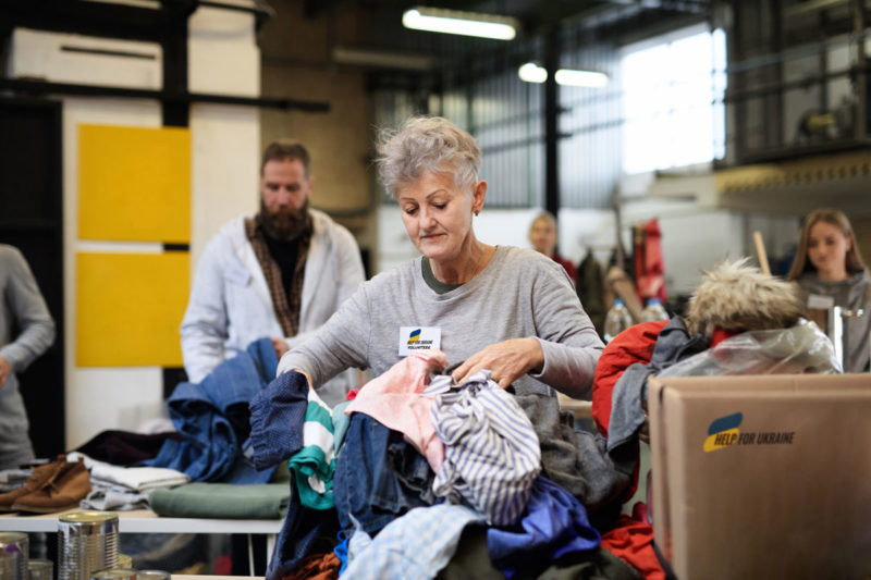 lady sorting clothing