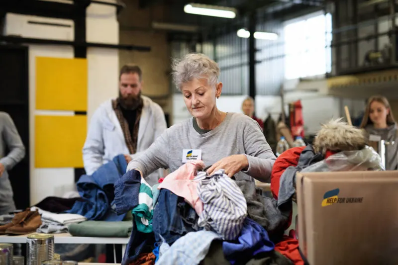 lady sorting clothing