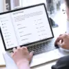 Person using a laptop to access